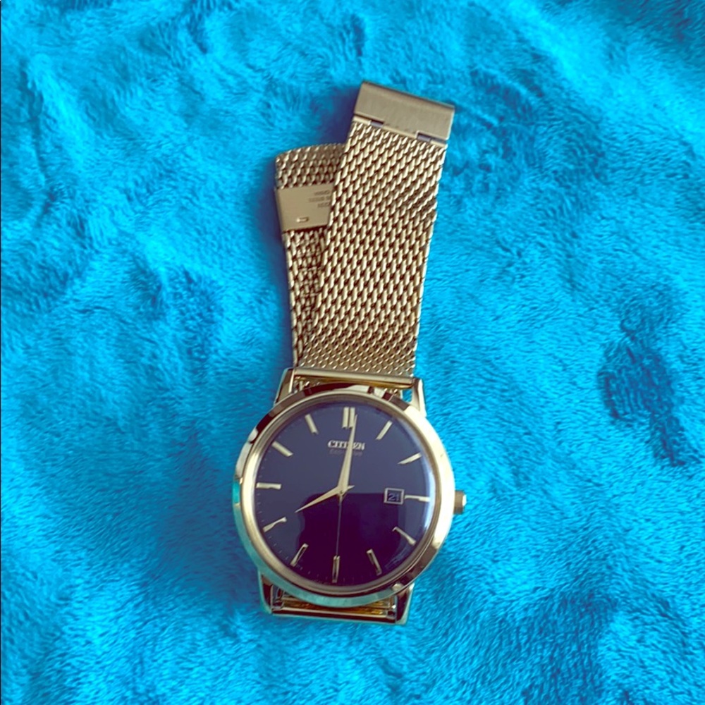 Citizen Eco-Drive gold watch